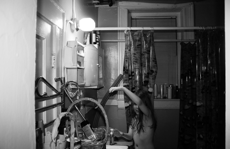 The Child Experiments with Dripping Water from One Hand to Another