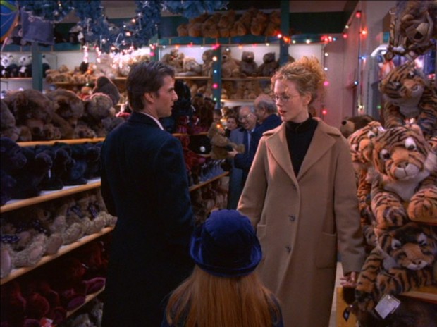 Eyes Wide Shut - Two men looking at bear toy