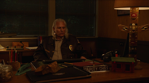 Hawk at his Desk